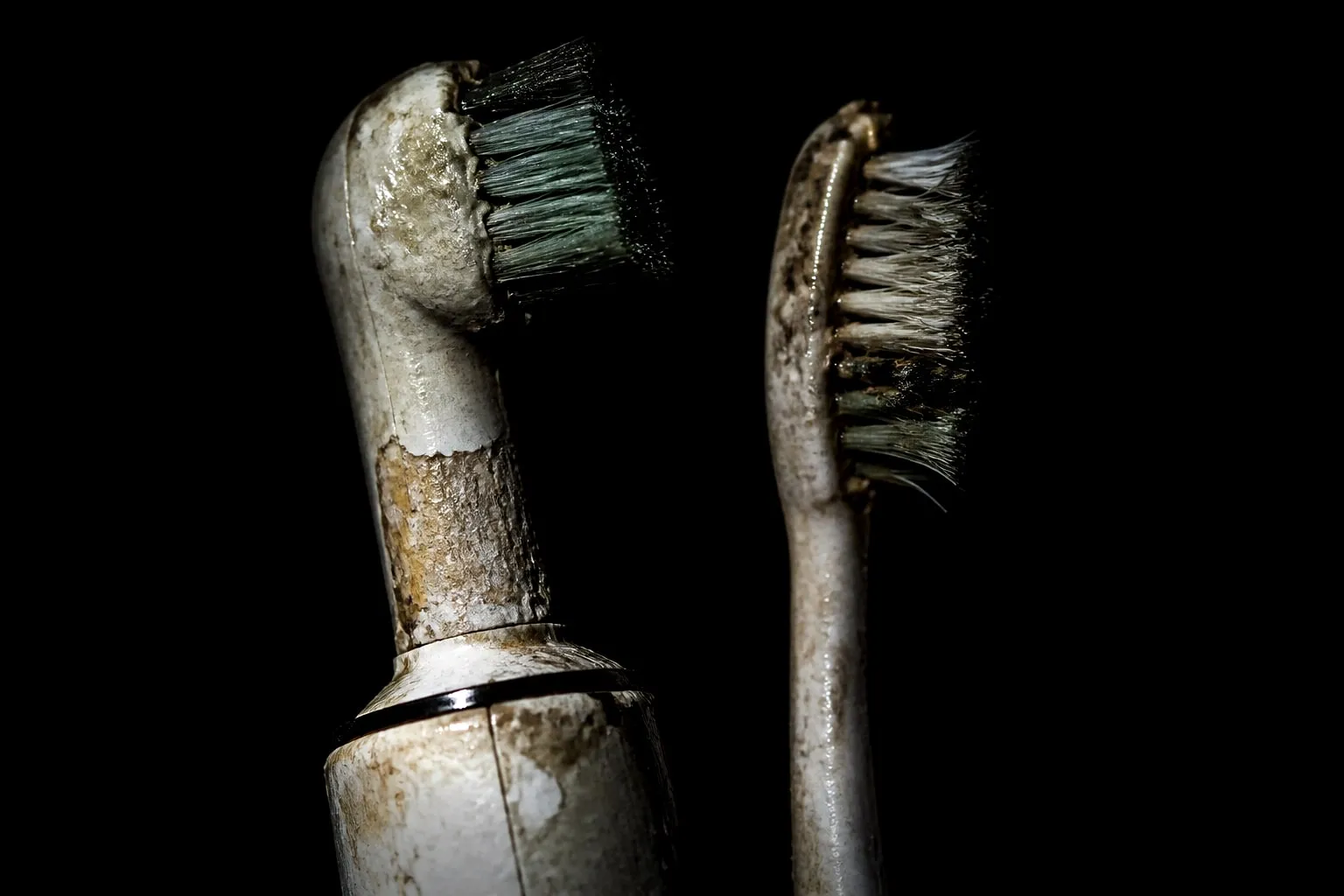 Editorial illustration: electric toothbrush and manual toothbrush together
