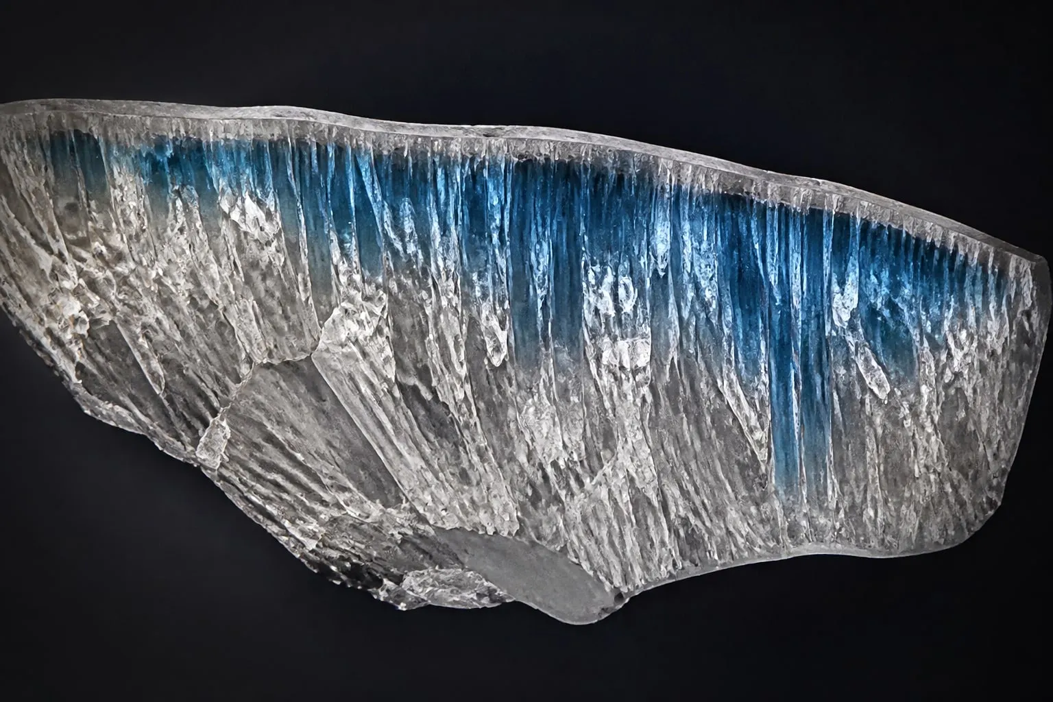 Editorial illustration: A chipped human molar enamel shard under a microscope, its fractured prisms glittering like shat